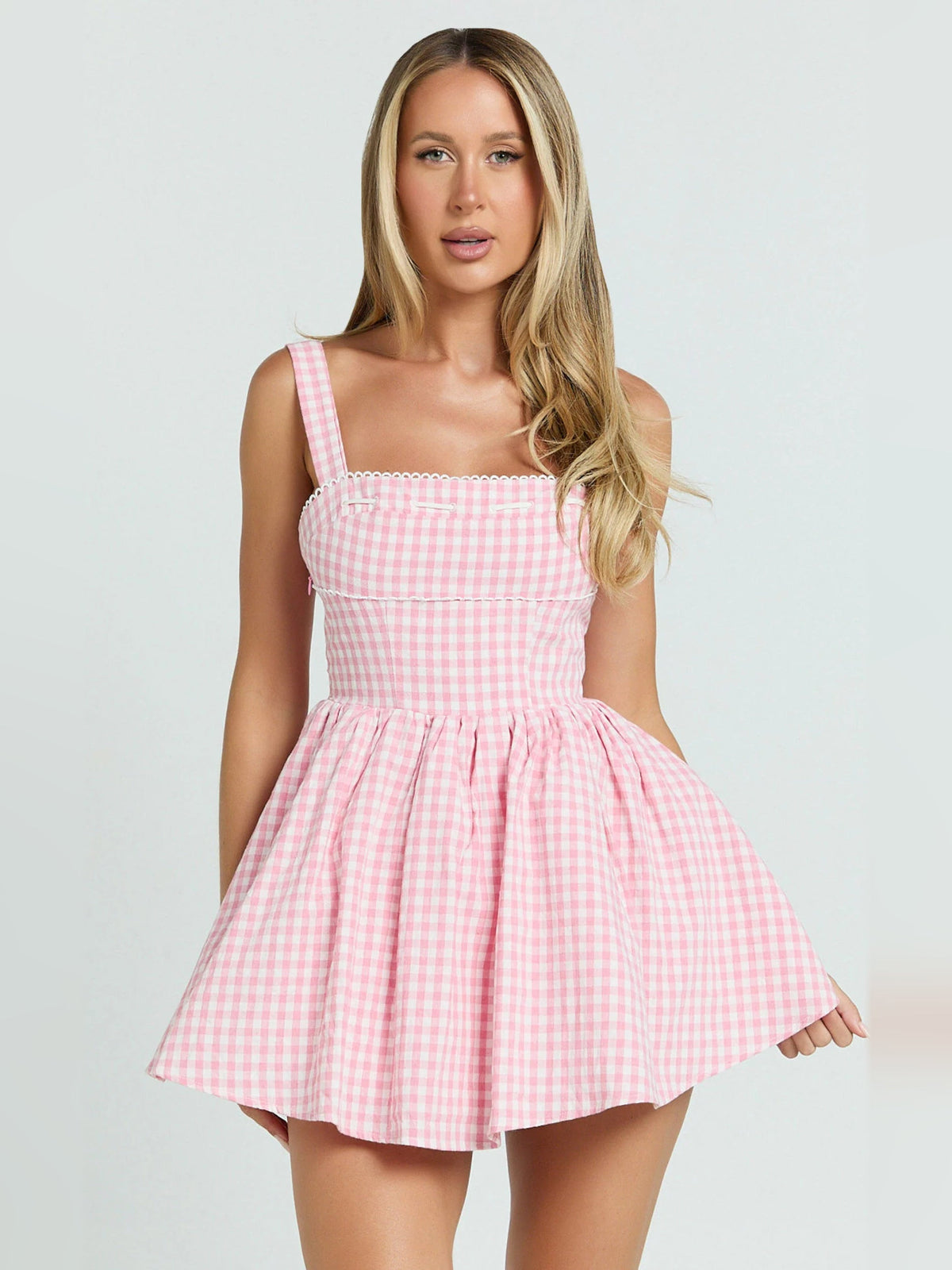 Pink gingham mini dress, square neckline, fitted bodice with flared hem