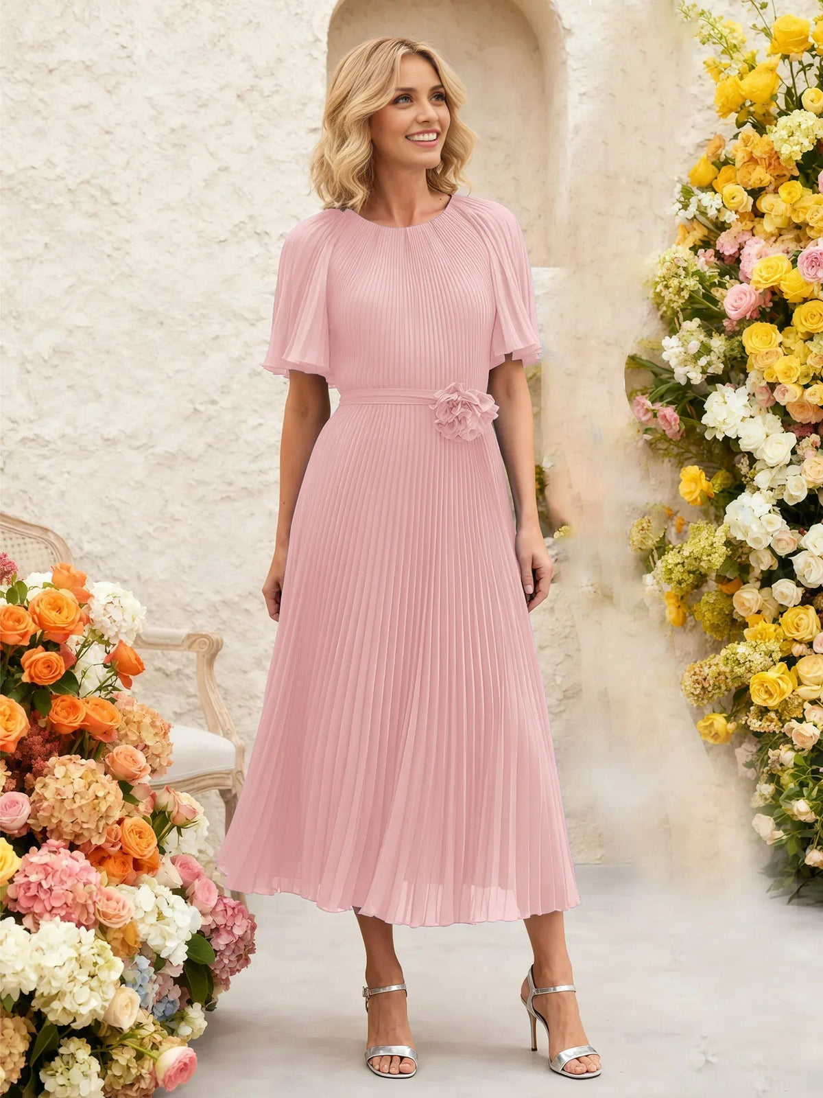 Dusty rose pleated chiffon midi dress with flutter sleeves and floral waist tie detail
