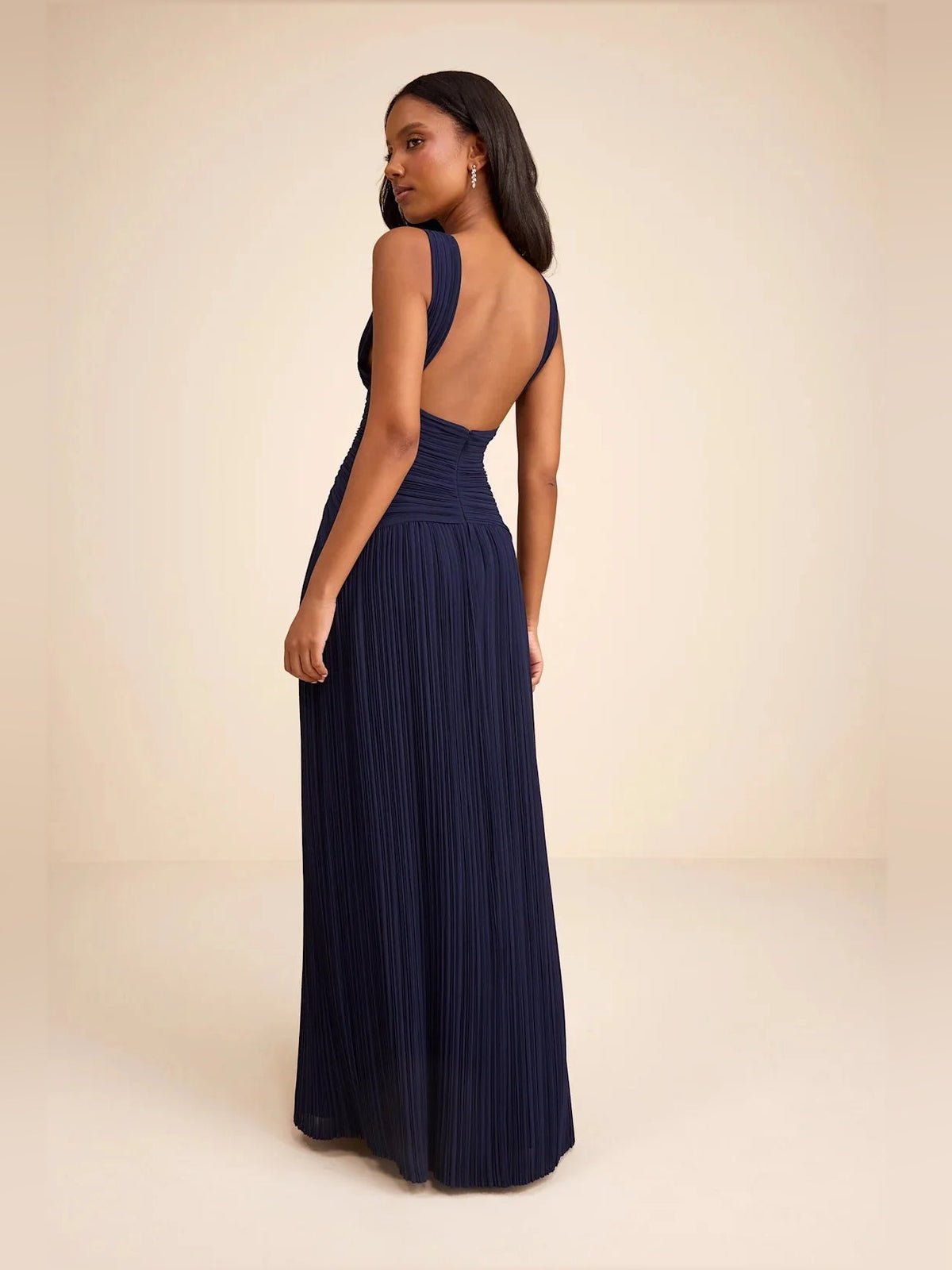 Navy sleeveless V-neck maxi dress with ruched bodice and pleated chiffon skirt