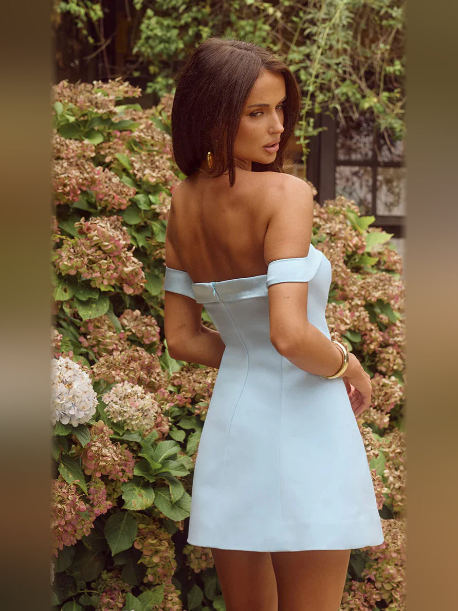 Light blue off-shoulder mini dress with sweetheart neckline and fitted A-line skirt, side view