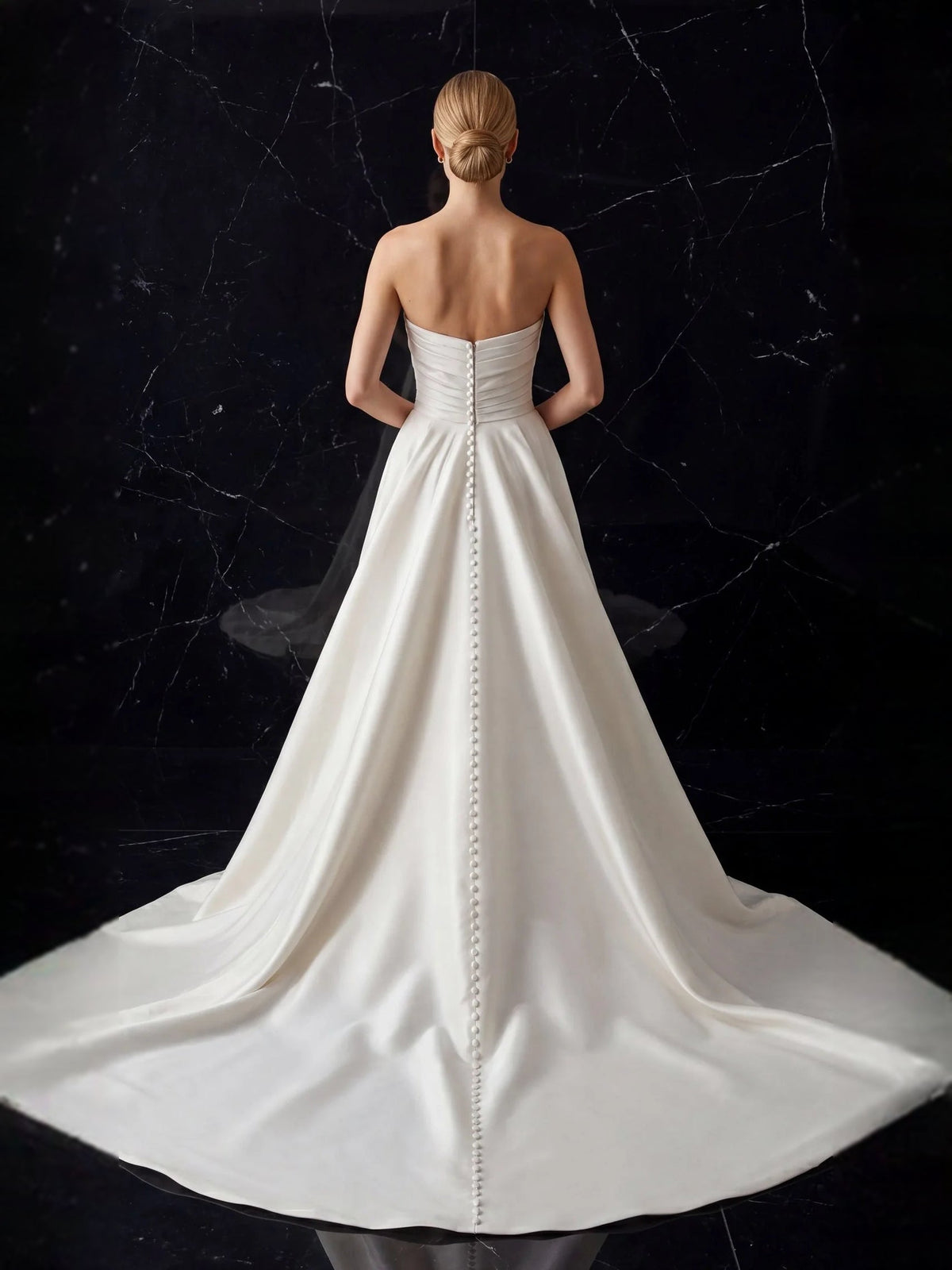 Ivory satin wedding dress back view, ruched waist seam detail, full floor-length skirt
