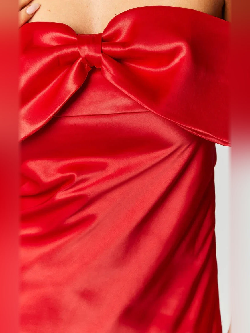 Red satin bow detail on off-shoulder mini dress bodice