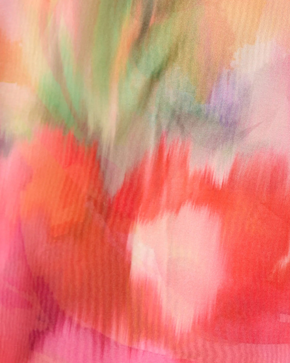 Watercolor floral fabric swatch in pink, green, cream, and yellow tones.