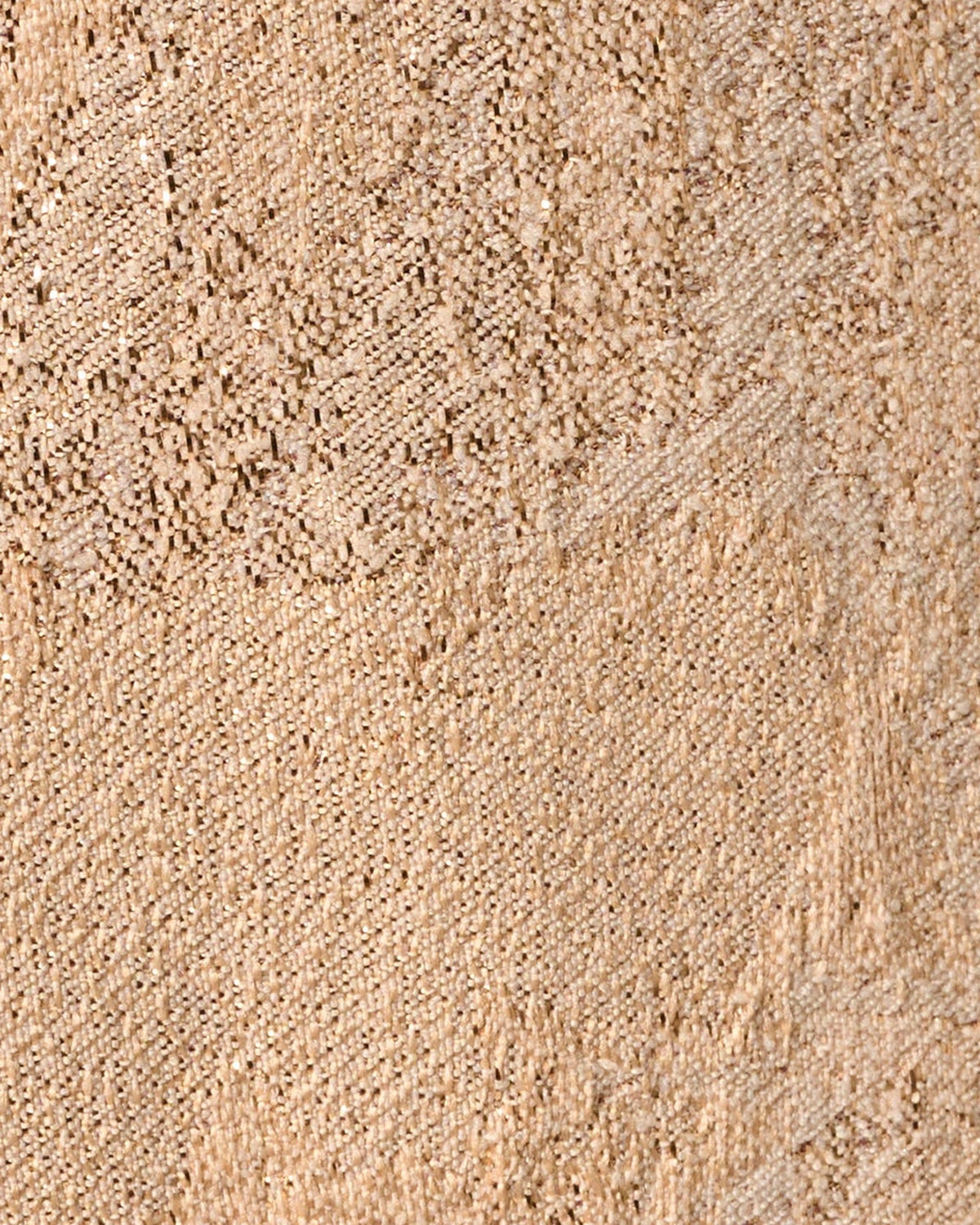 Champagne shimmer fabric close-up with fine textured sparkle weave