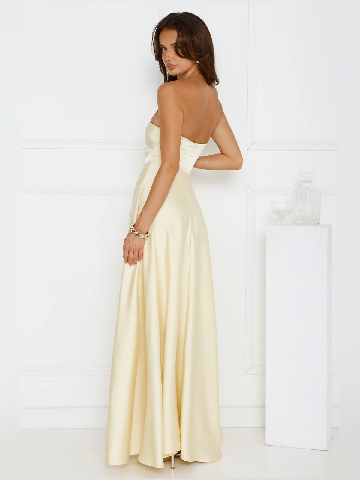 Yellow a-line maxi formal dress with skirt slit, alternate view showing the hem
