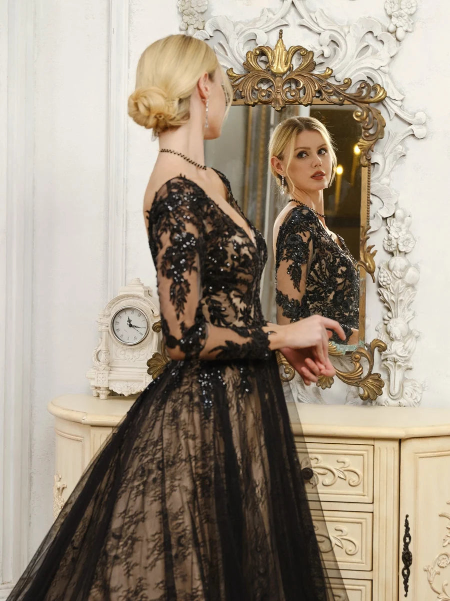 Black sequin A-line wedding dress showing side/back corset bodice and long sleeves