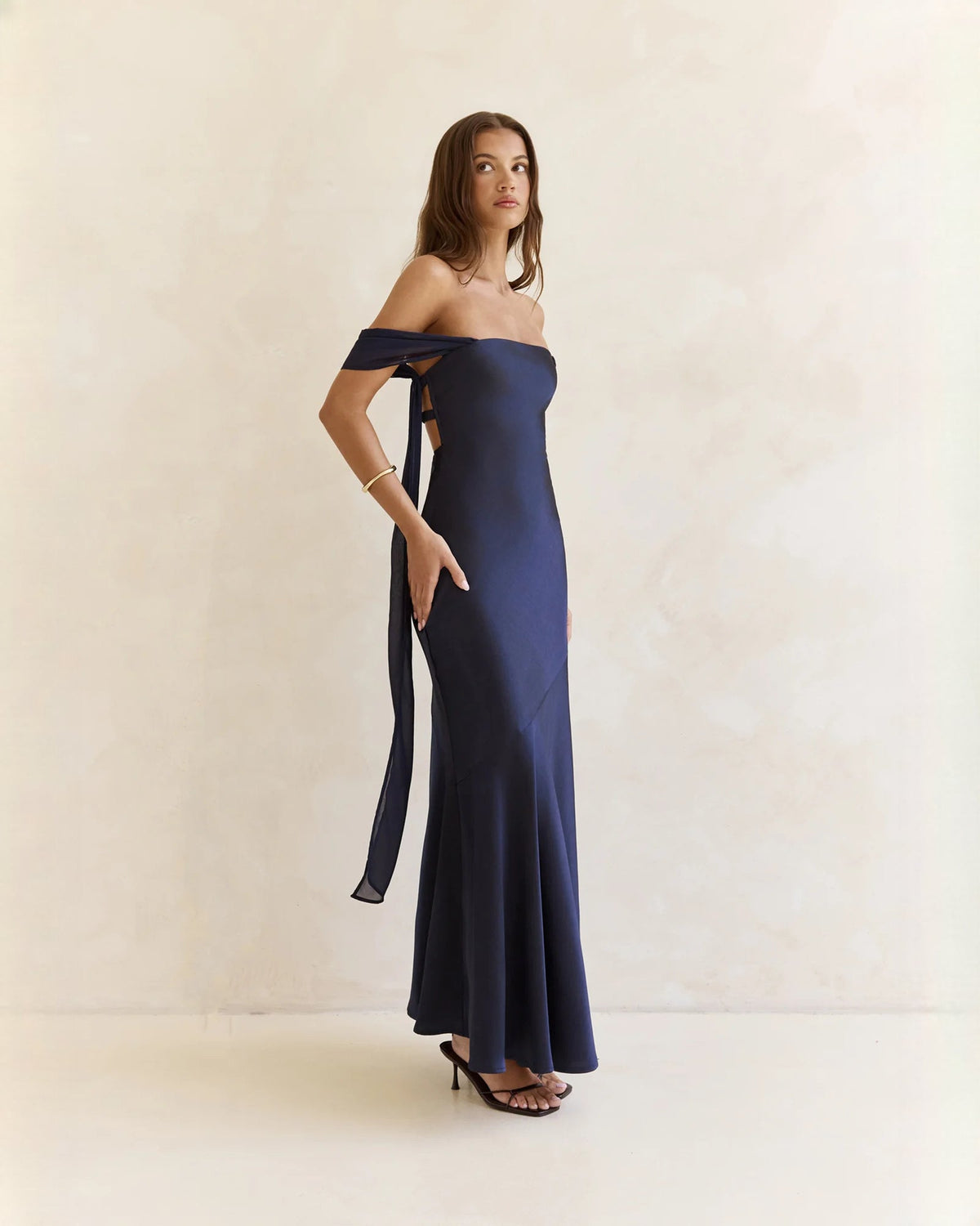 Navy satin off-shoulder A-line maxi dress with side slit and hanging back ties