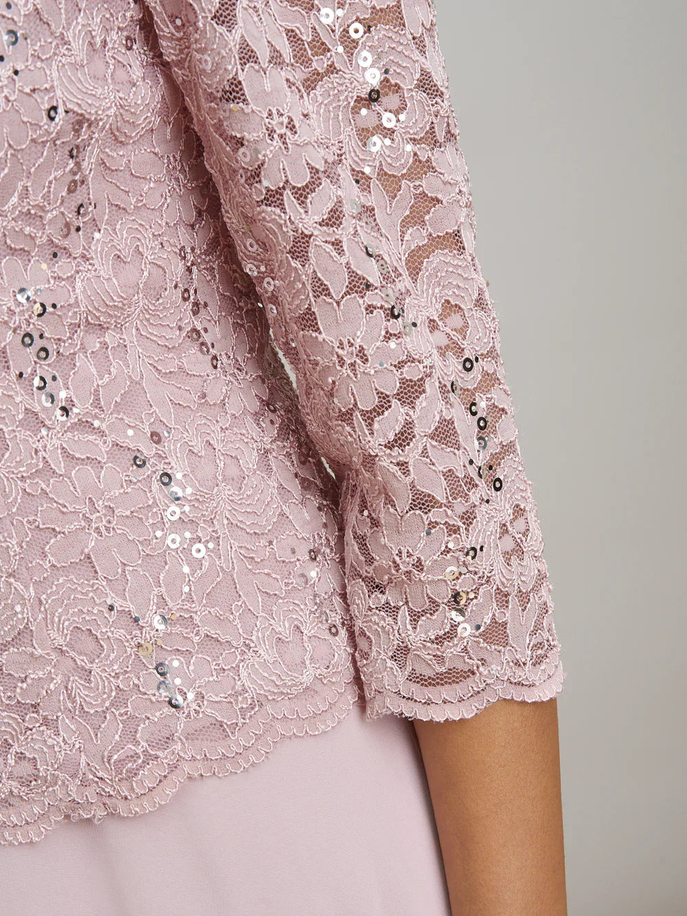 Dusty pink sequin lace sleeve detail on an A-line midi chiffon dress