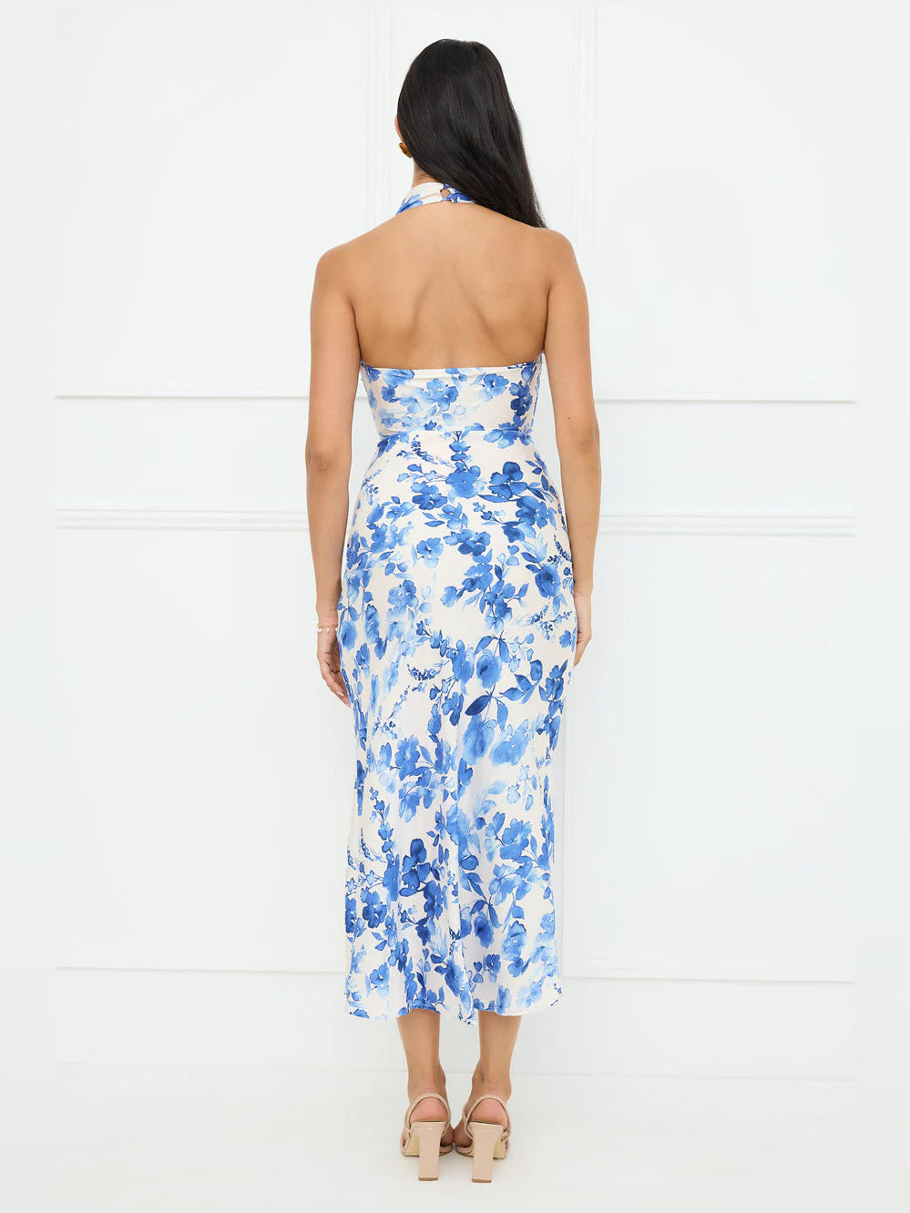 Blue floral halter midi dress back view with crisscross straps