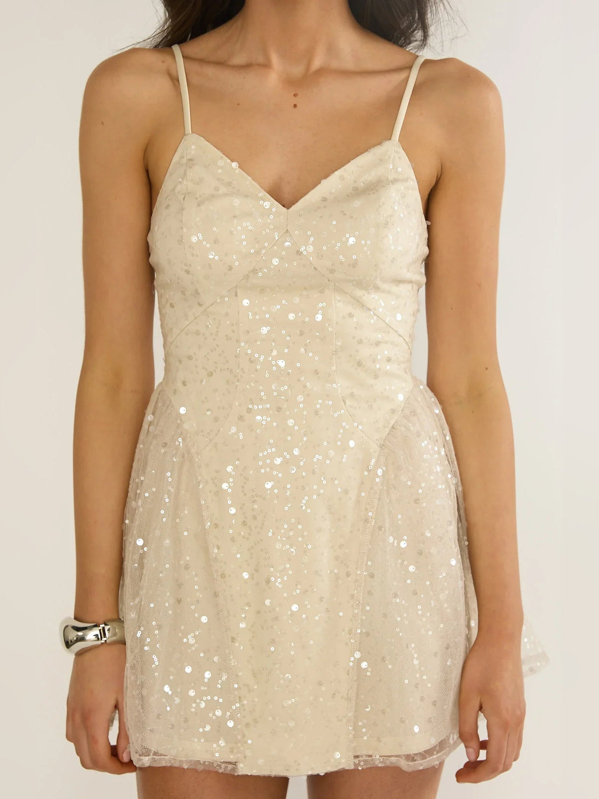 Champagne sequin V-neck mini tulle dress front close-up with thin straps