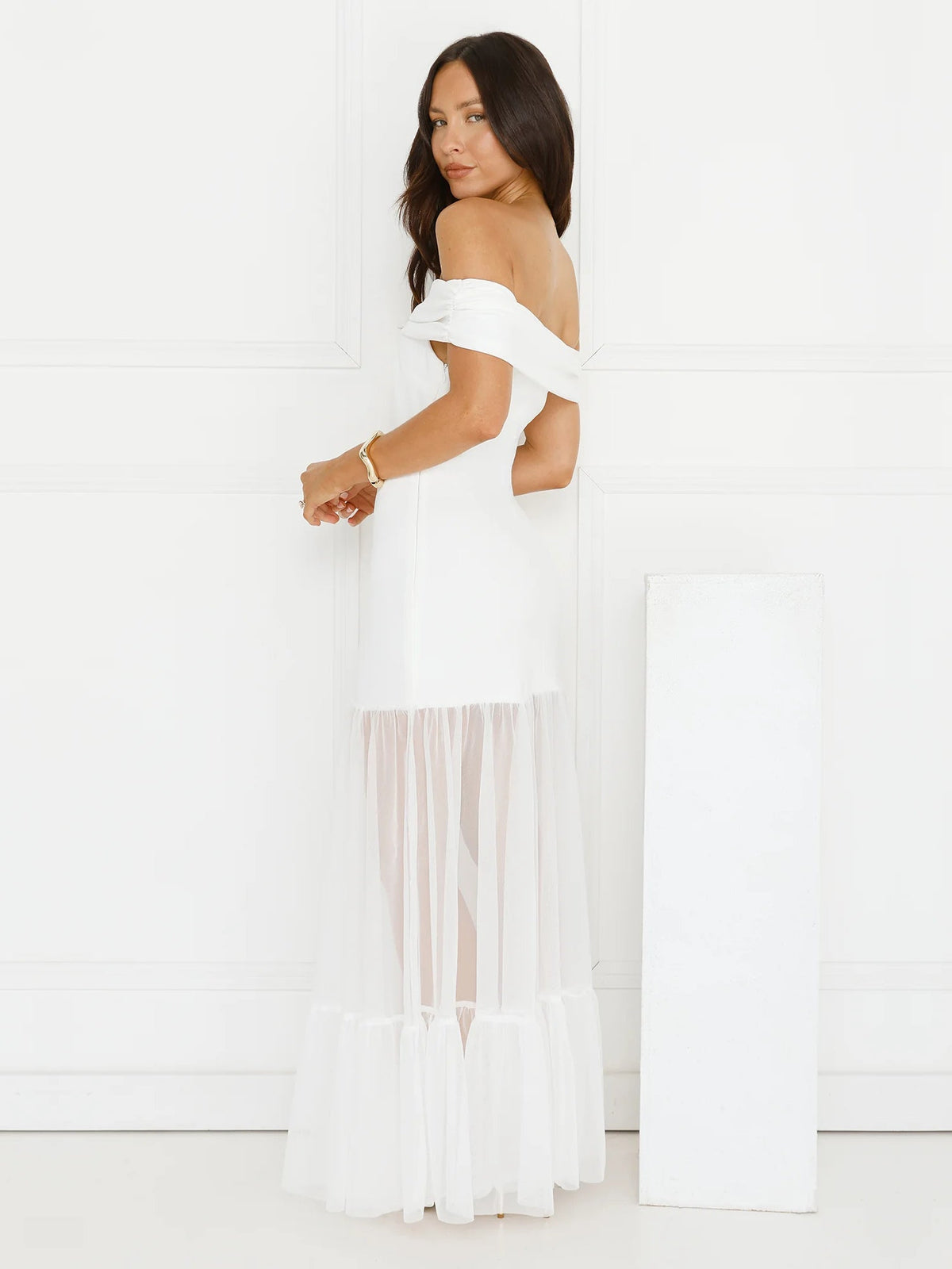 White sheath maxi formal dress with off-the-shoulder neckline, alternate view showing the hem