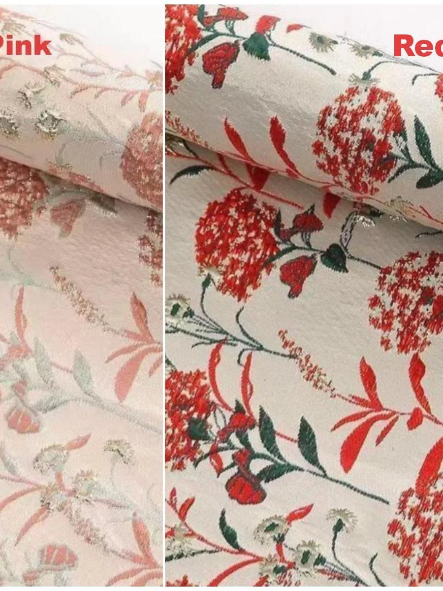 Red and green floral print fabric swatch on light base for formal mermaid dress