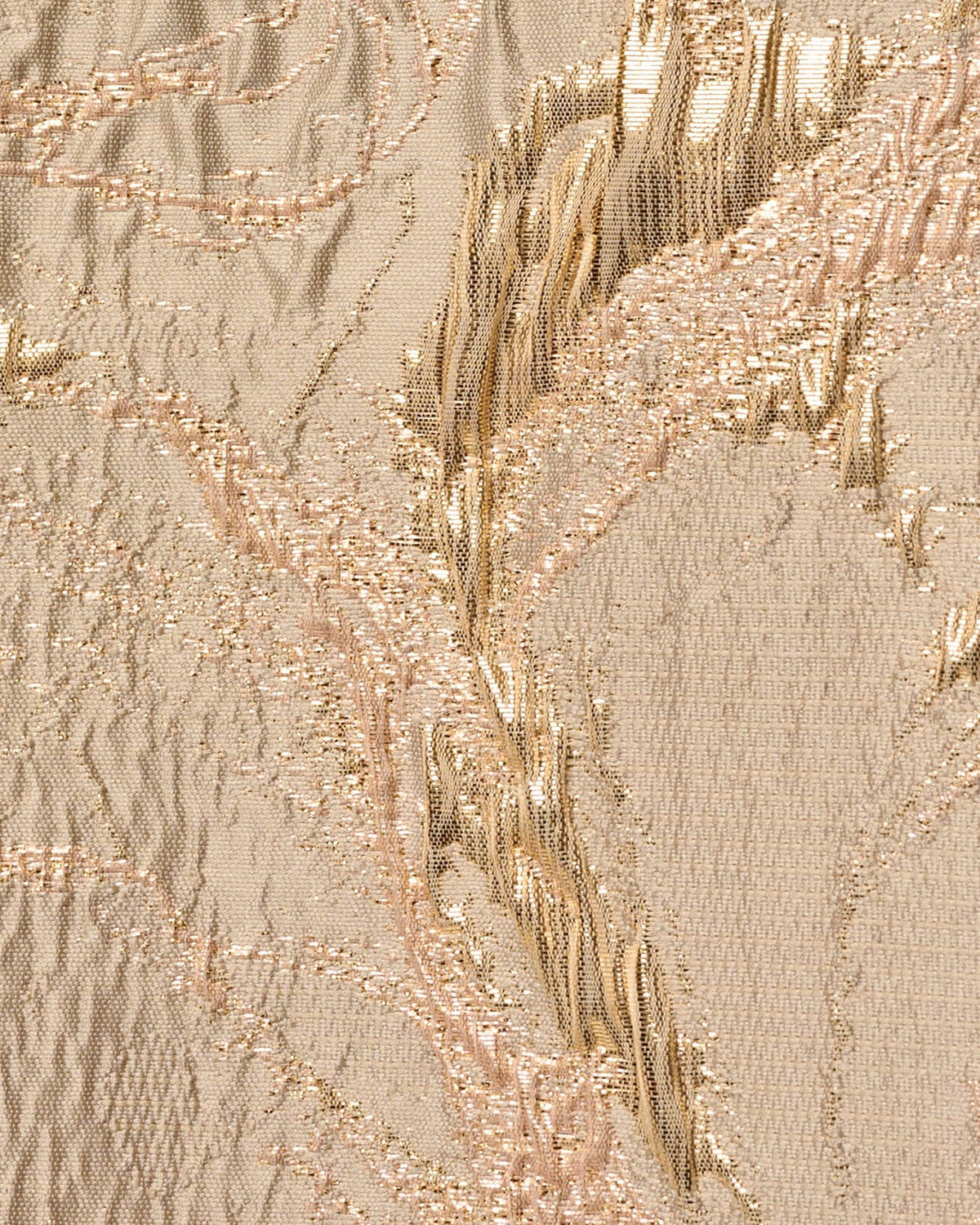 Mink fabric close-up with textured gold metallic thread pattern