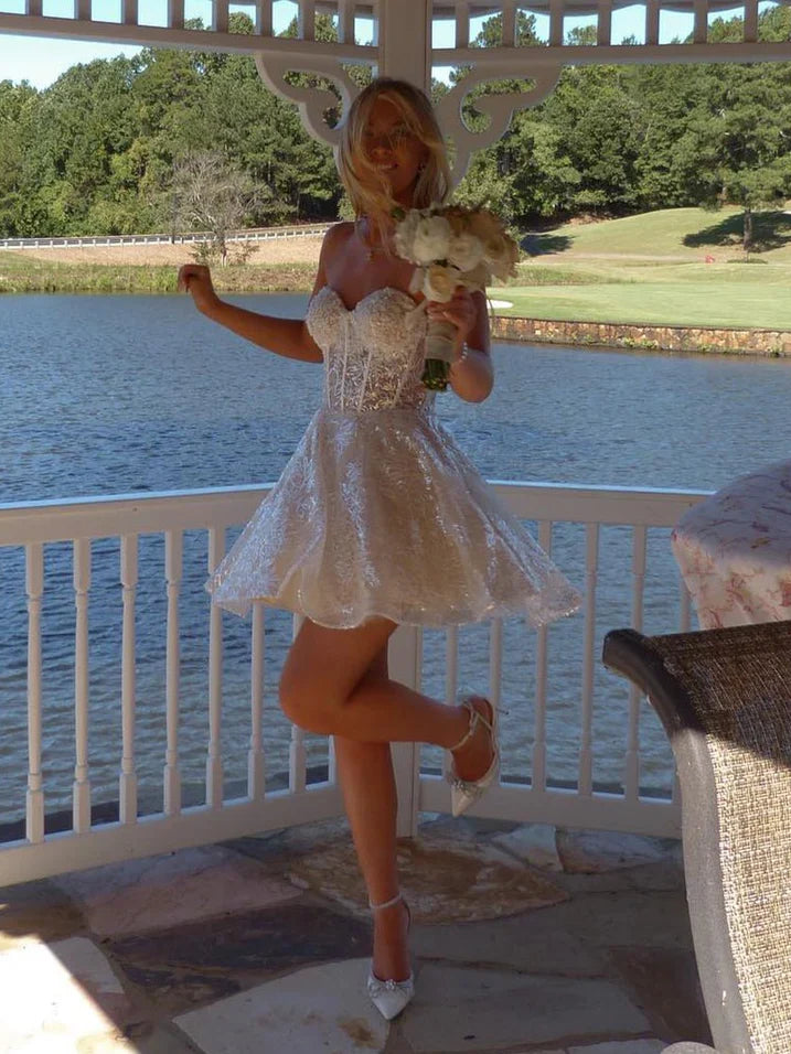 Light blue floral corset mini dress with puff sleeves and layered A-line skirt