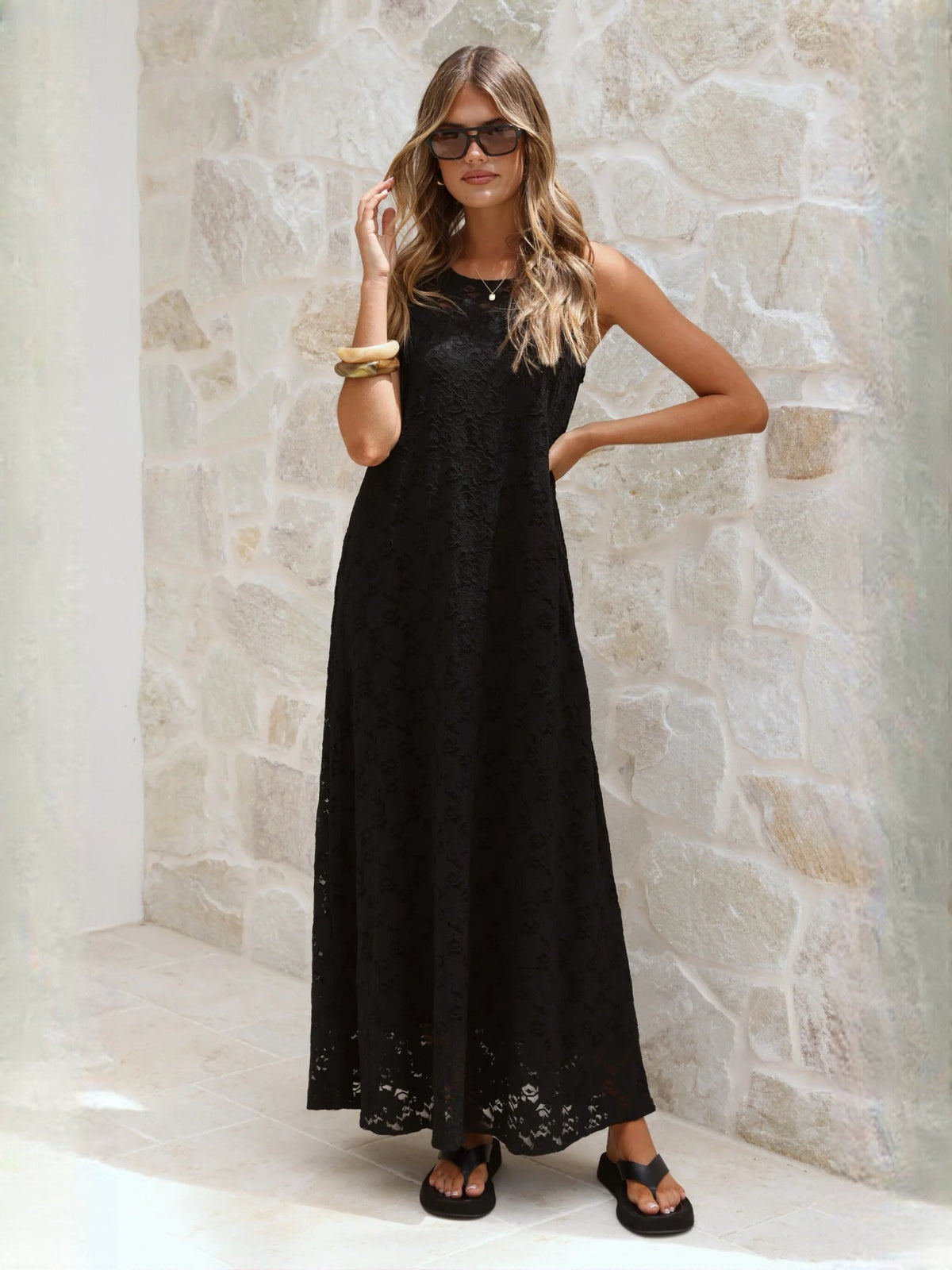 Black a-line maxi formal dress with V-neckline, alternate view showing the hem