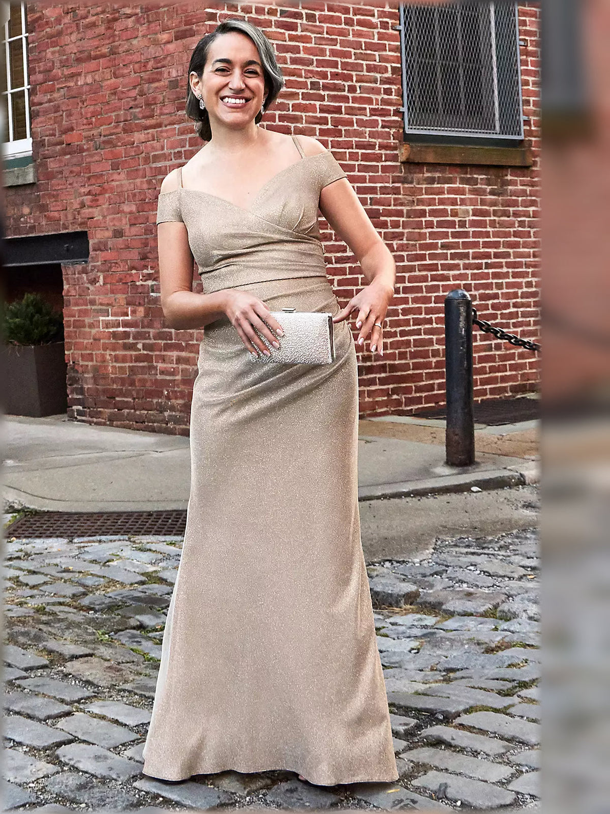 Champagne off-shoulder sheath dress with ruched waist and long glitter skirt