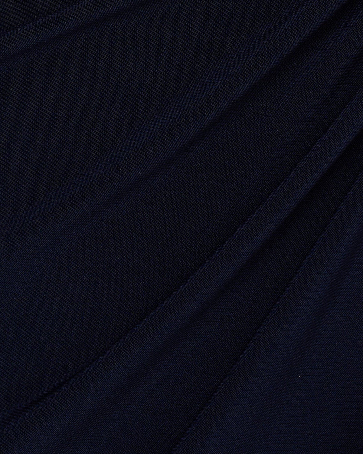 Midnight blue woven fabric with subtle diagonal texture and drape lines