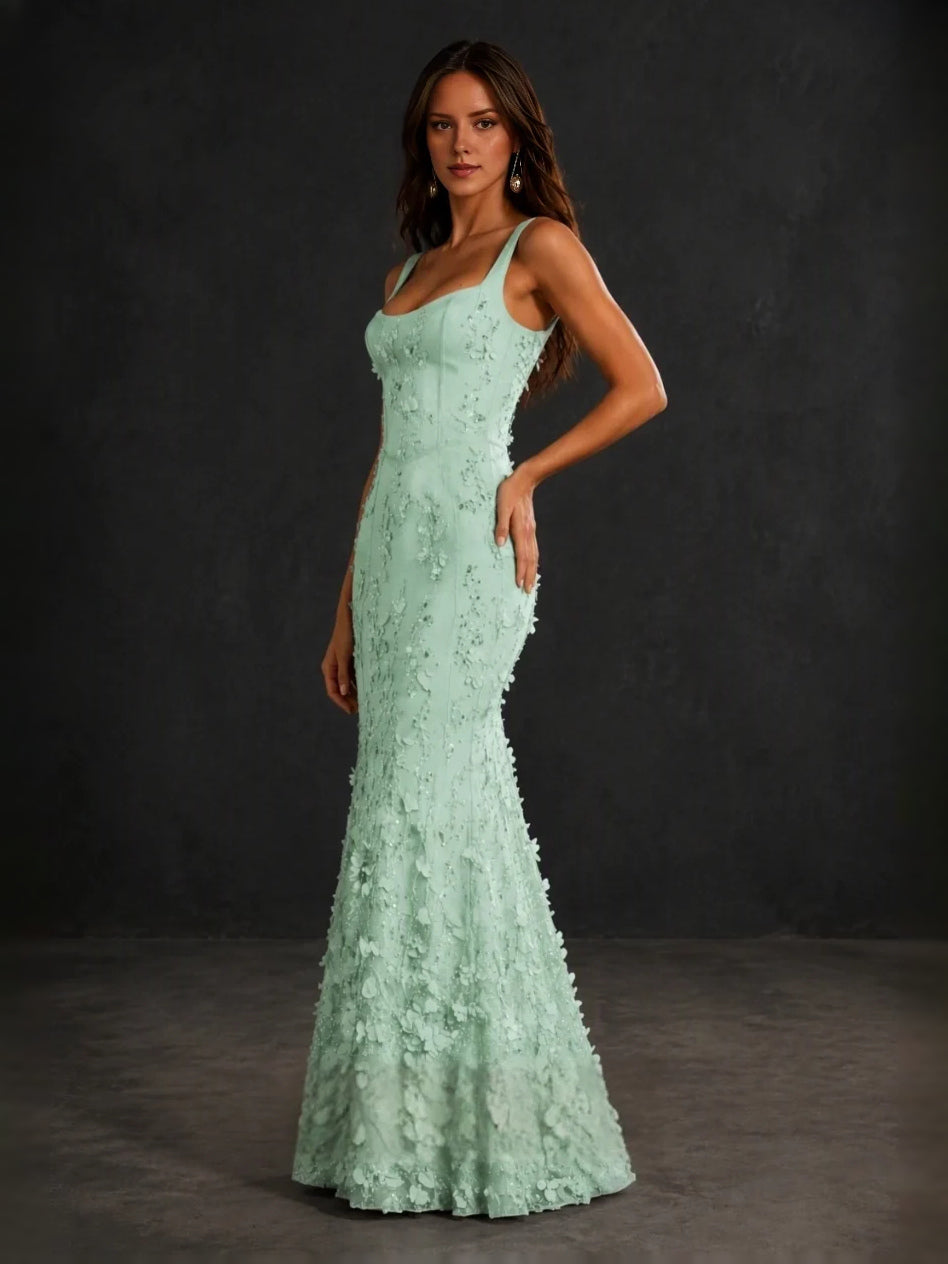 Mint green corset-style mermaid prom dress with square neckline and floral lace applique details