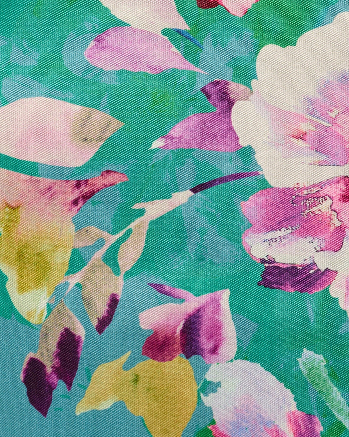 Green multicolor floral print fabric close-up