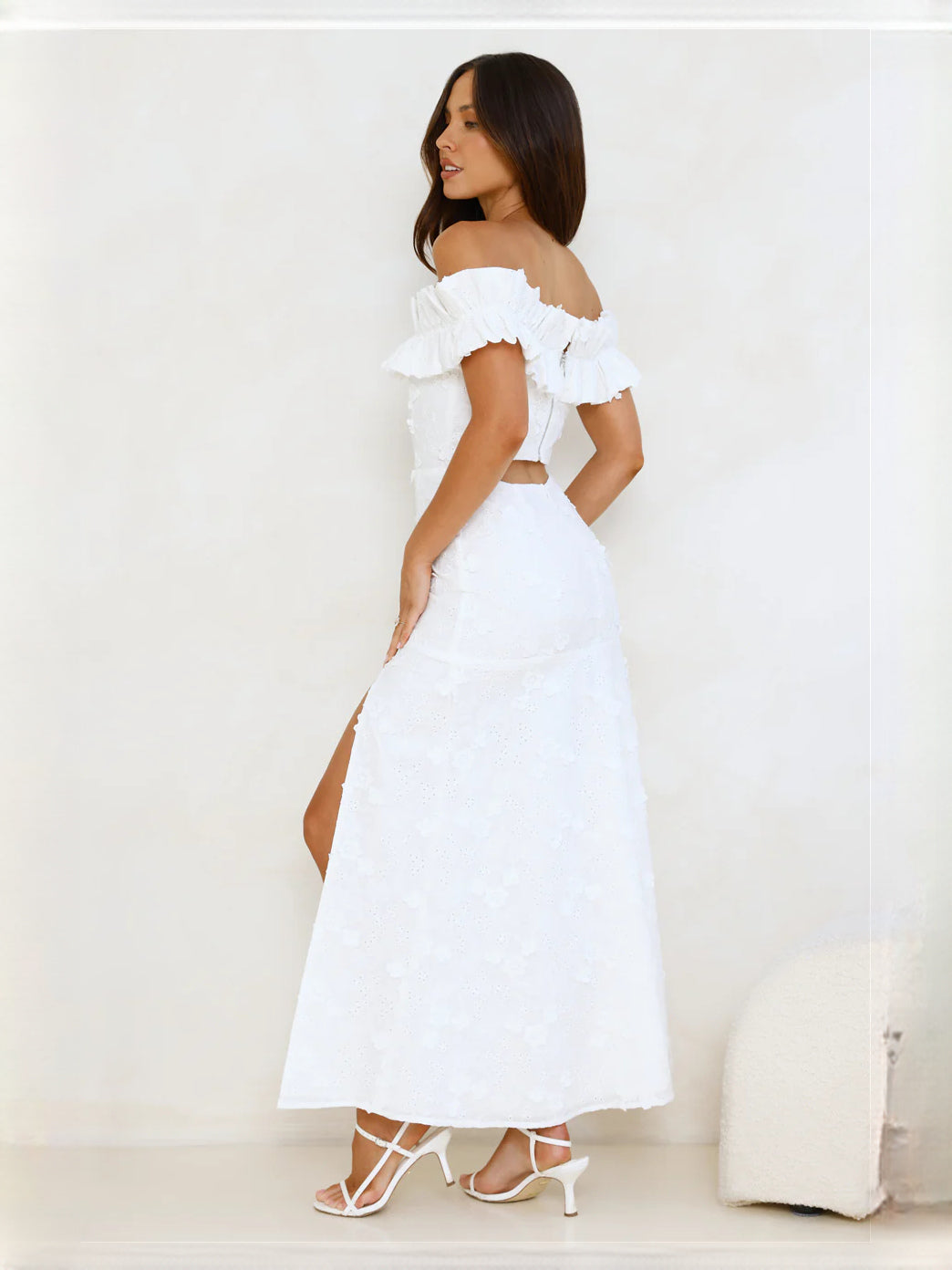 White off-the-shoulder ruffle maxi dress, side view, with short ruffled sleeves