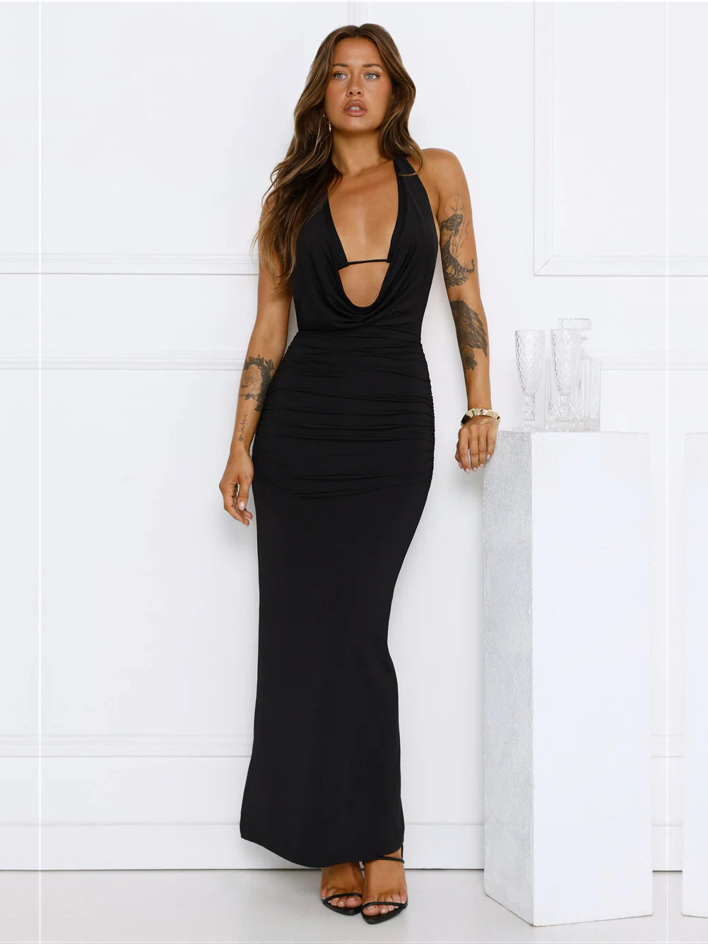 Black sheath maxi formal dress with cutout detail, alternate view showing the hem