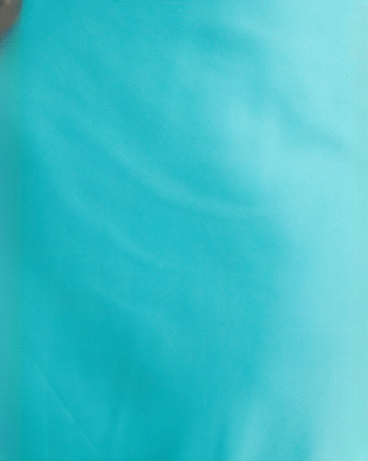 Close-up of aqua satin fabric with smooth, glossy sheen