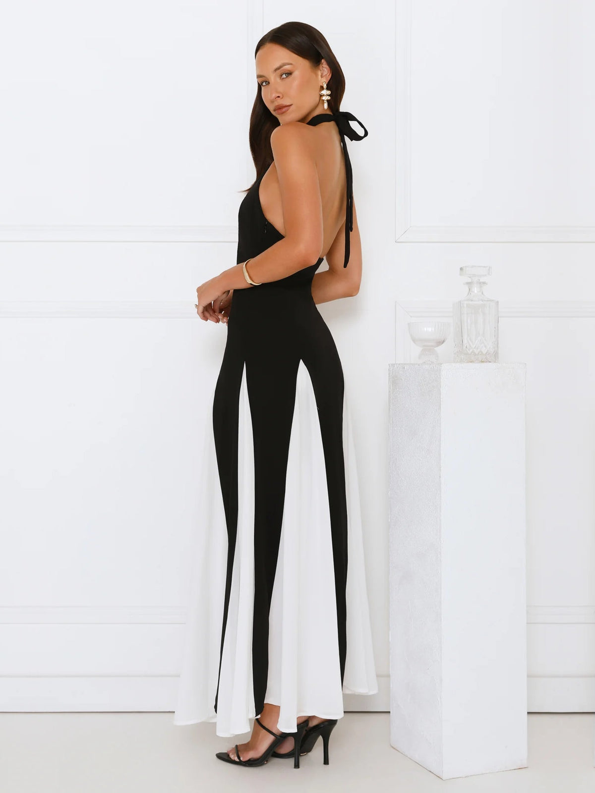 Black sheath maxi formal dress with cutout detail, alternate view showing the hem