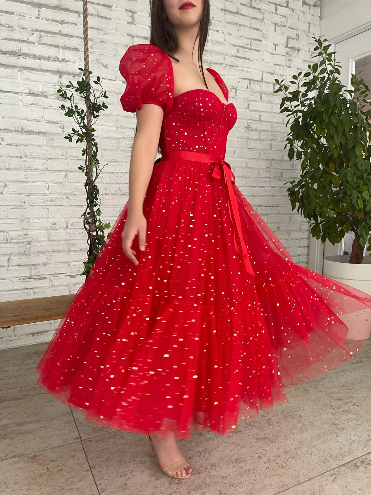 Red sweetheart corset midi tulle prom dress with puff sleeves and full pleated skirt