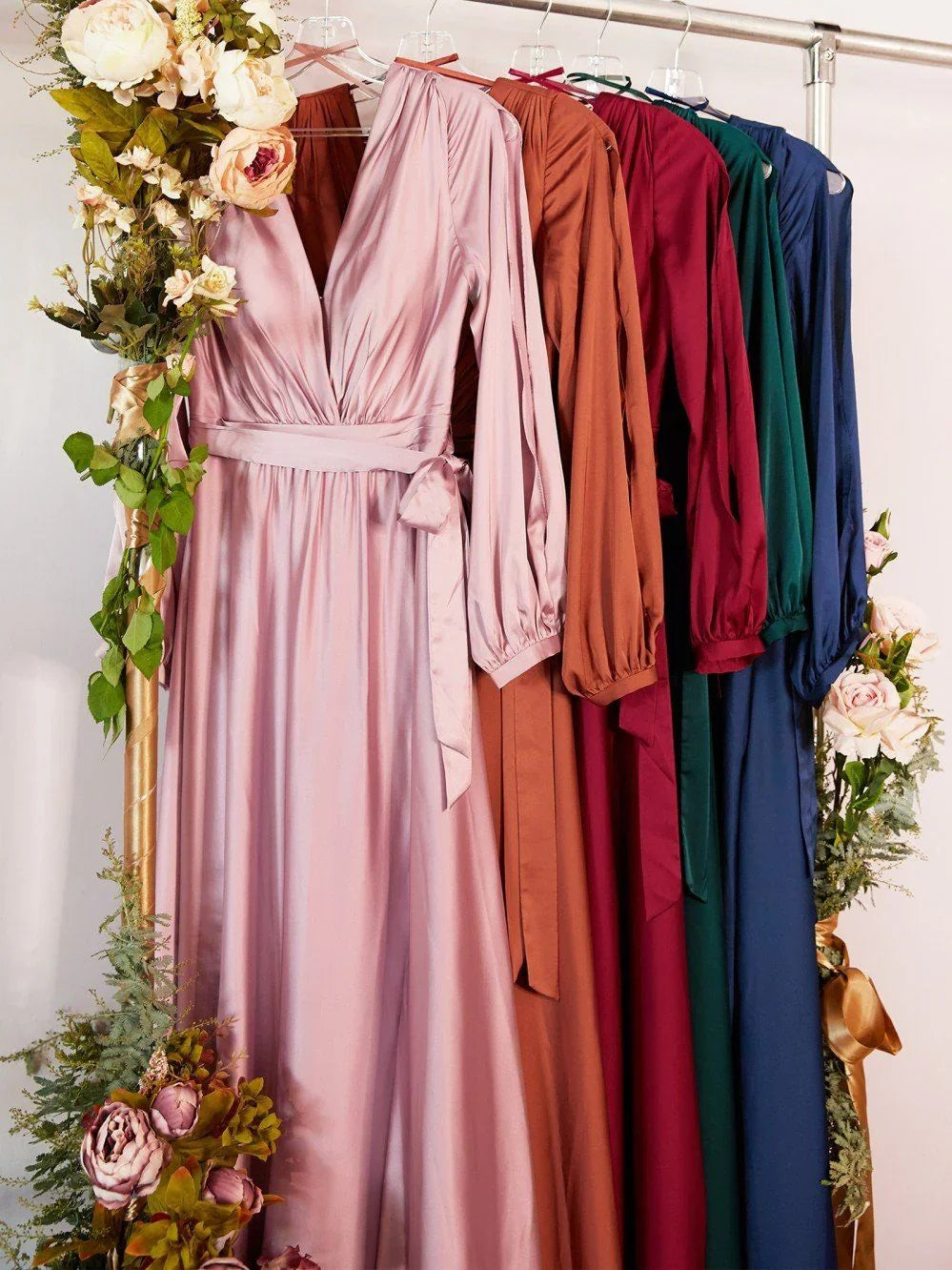 V-neck long-sleeve pleated formal dress in dusty rose satin with bow-tie waist