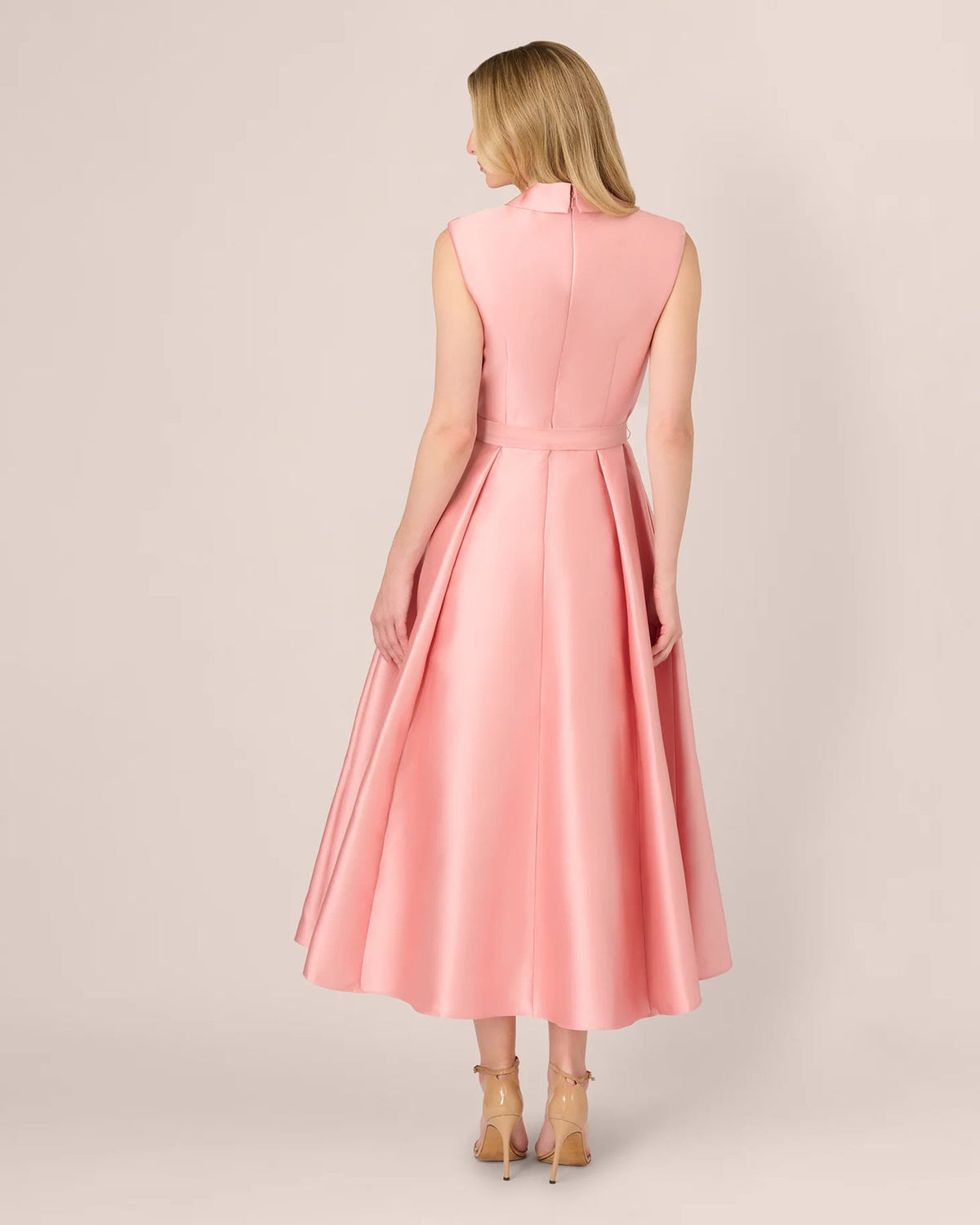 Apricot pink sleeveless maxi dress with rounded back and gathered waist seam