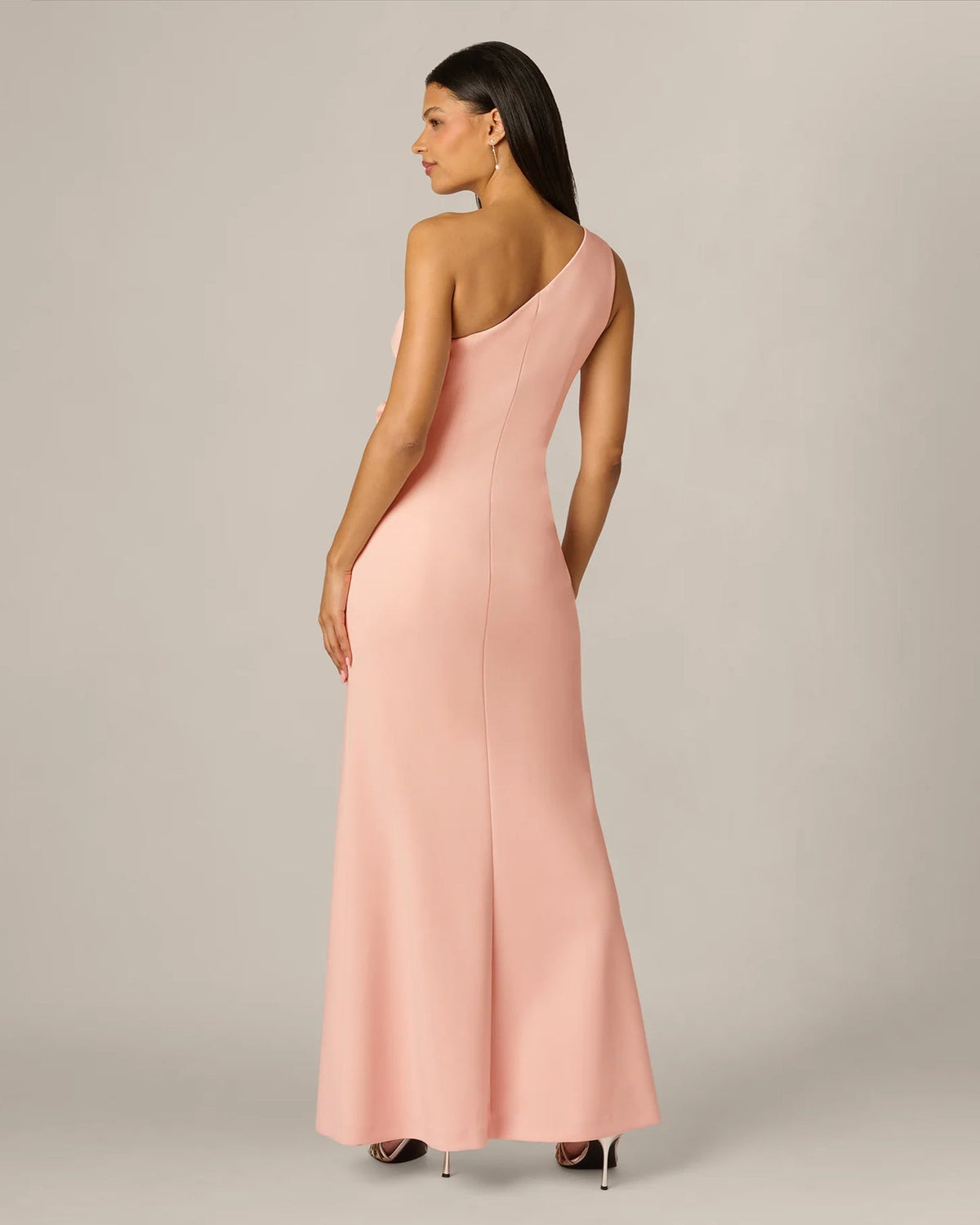 Pink one-shoulder A-line maxi dress, back view with smooth drape