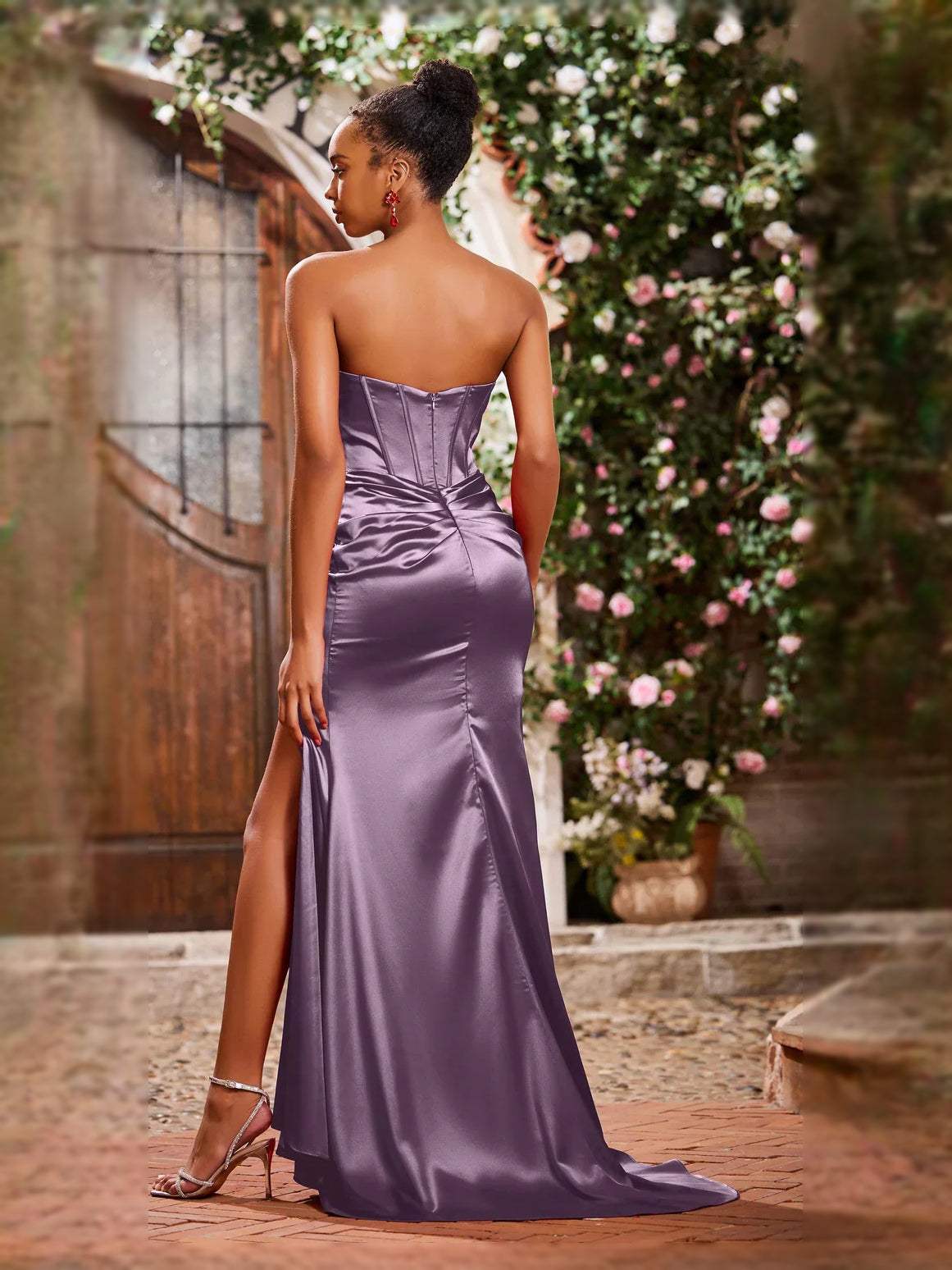 Lavender satin strapless mermaid dress with ruched corset and side slit (back view)