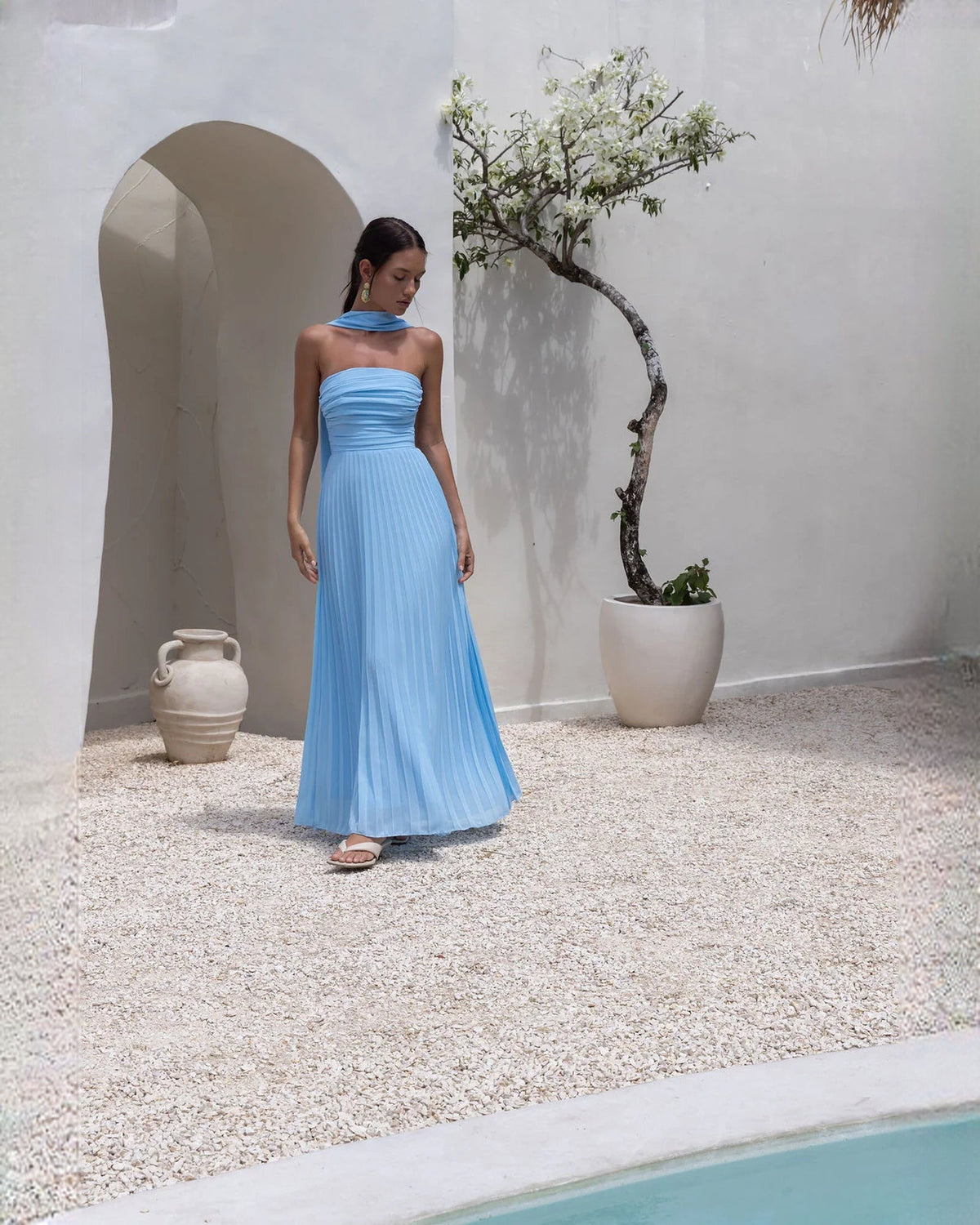 Blue strapless chiffon maxi A-line dress with open back and pleated drape