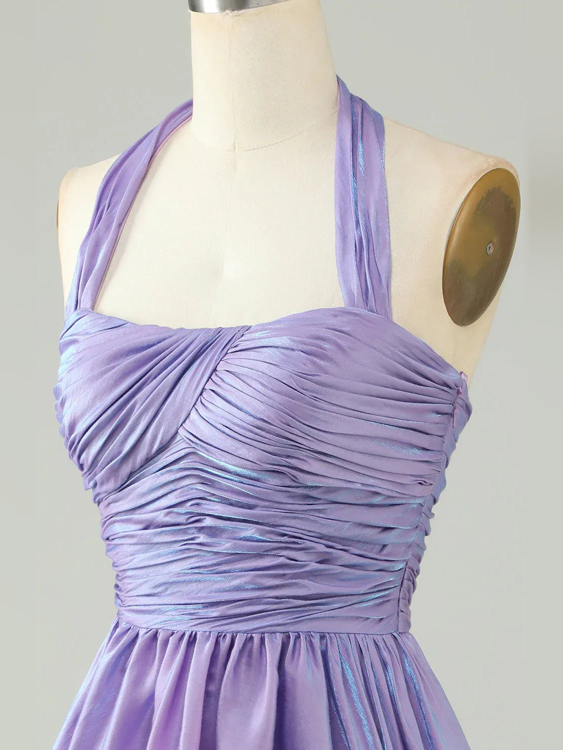 Close-up of lavender ruched halter mini dress bodice with gathered twist detail