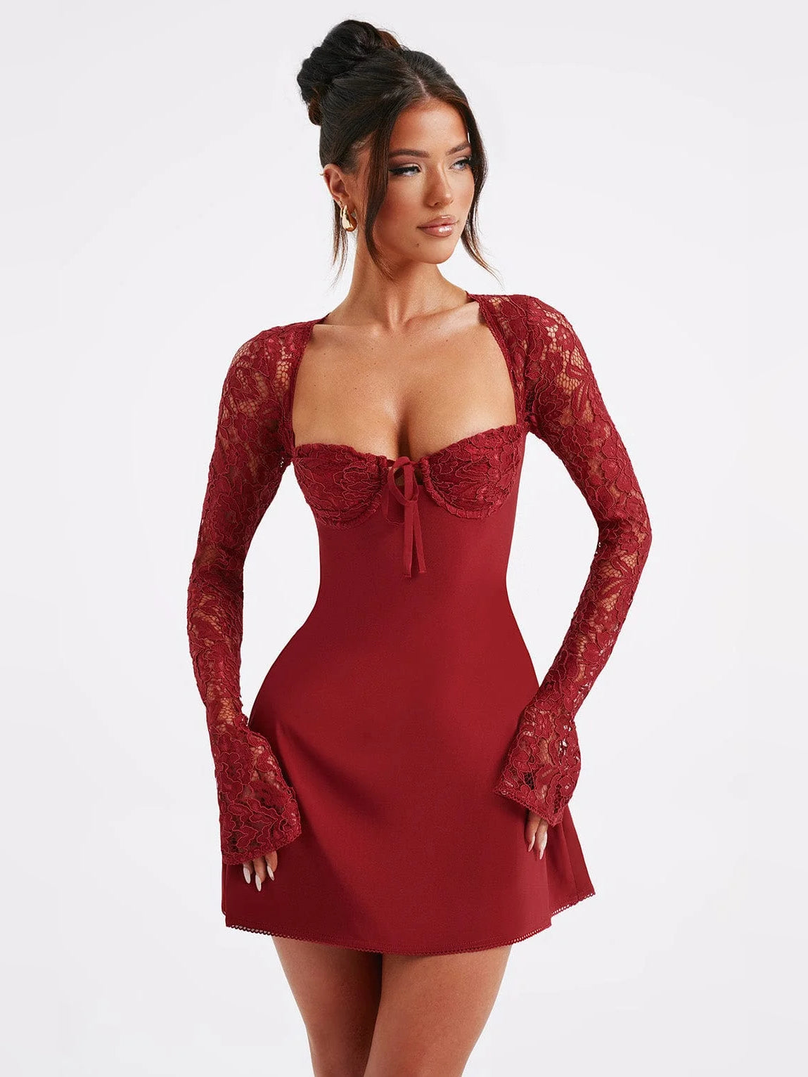 Red mini dress with sweetheart neckline, lace long sleeves, and tie-bow front detail