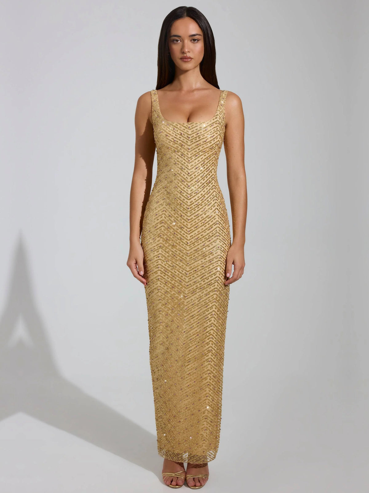 Gold sheath maxi formal dress with sequins, alternate view showing the hem