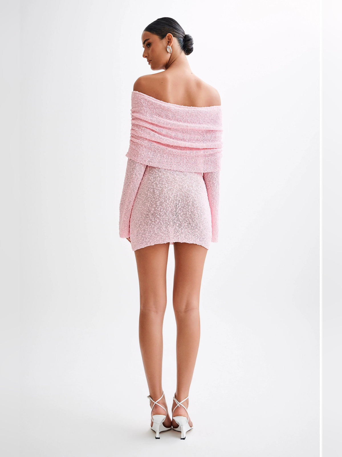 Baby pink off-shoulder mini dress, back view with off-shoulder neckline and ruffle sleeves