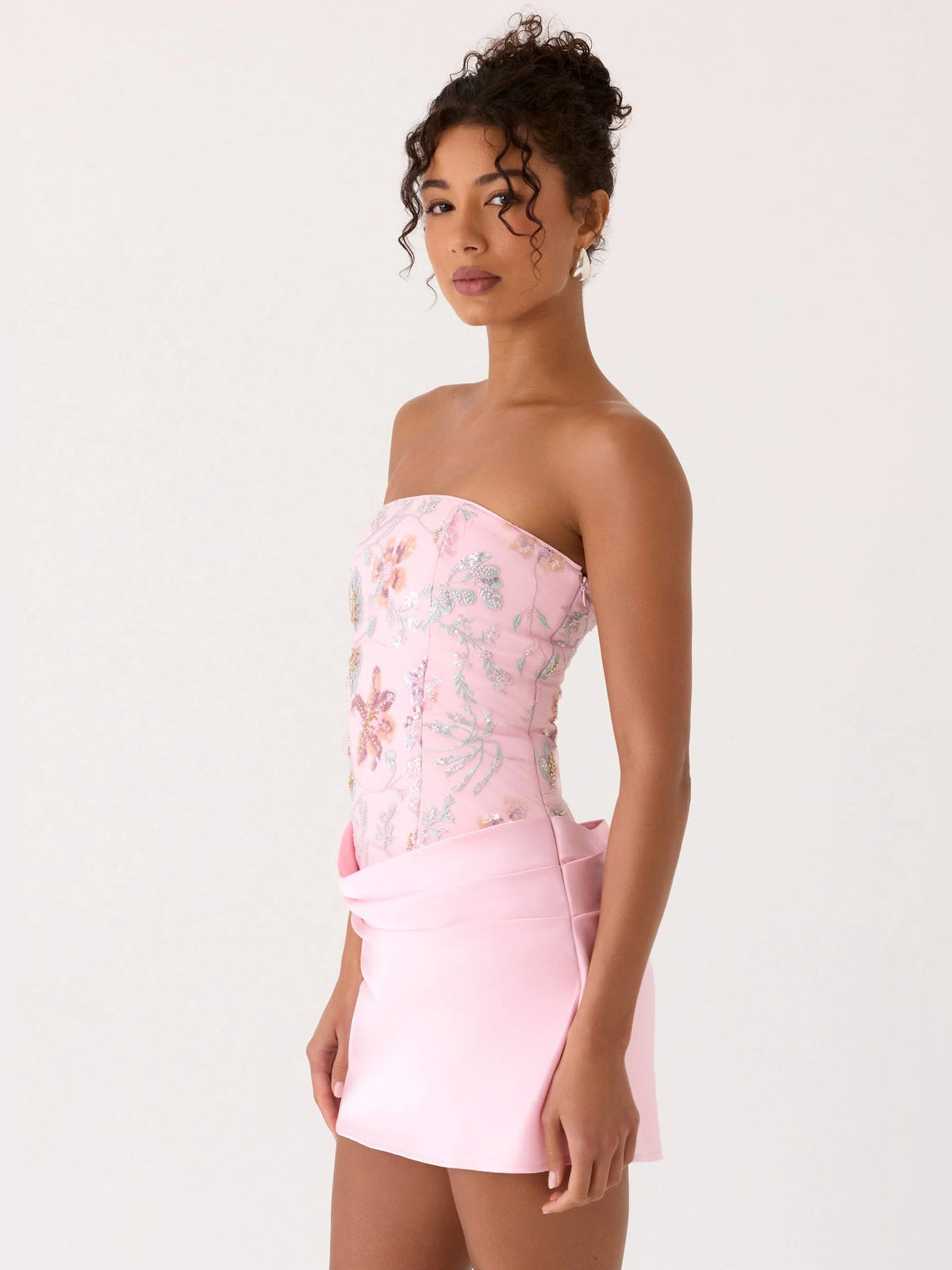 Pink strapless mini dress with beaded floral bodice and ruched satin waist