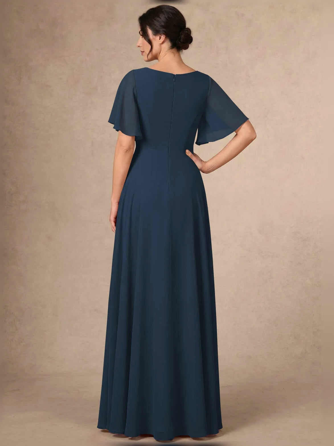 Navy sequin A-line maxi chiffon dress, back view with flutter sleeves