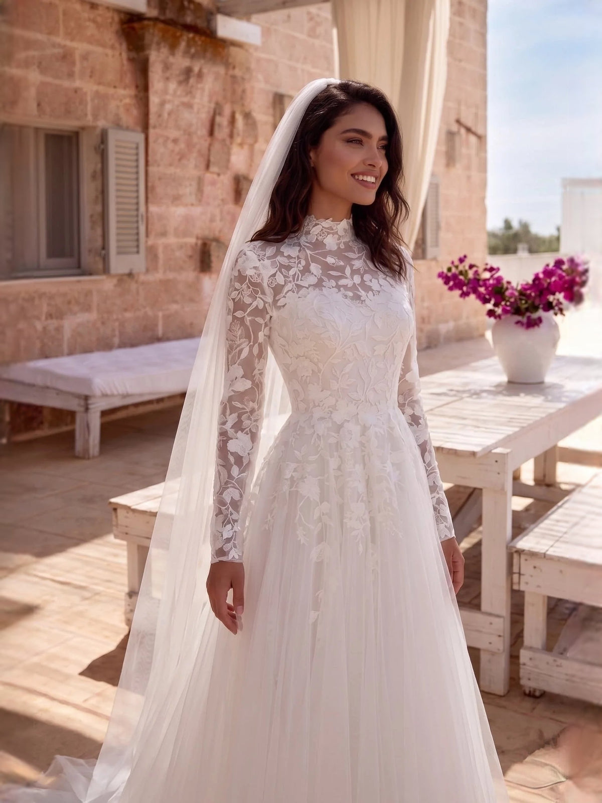 Ivory high-neck lace tulle A-line wedding dress with long sleeves and sheer veil