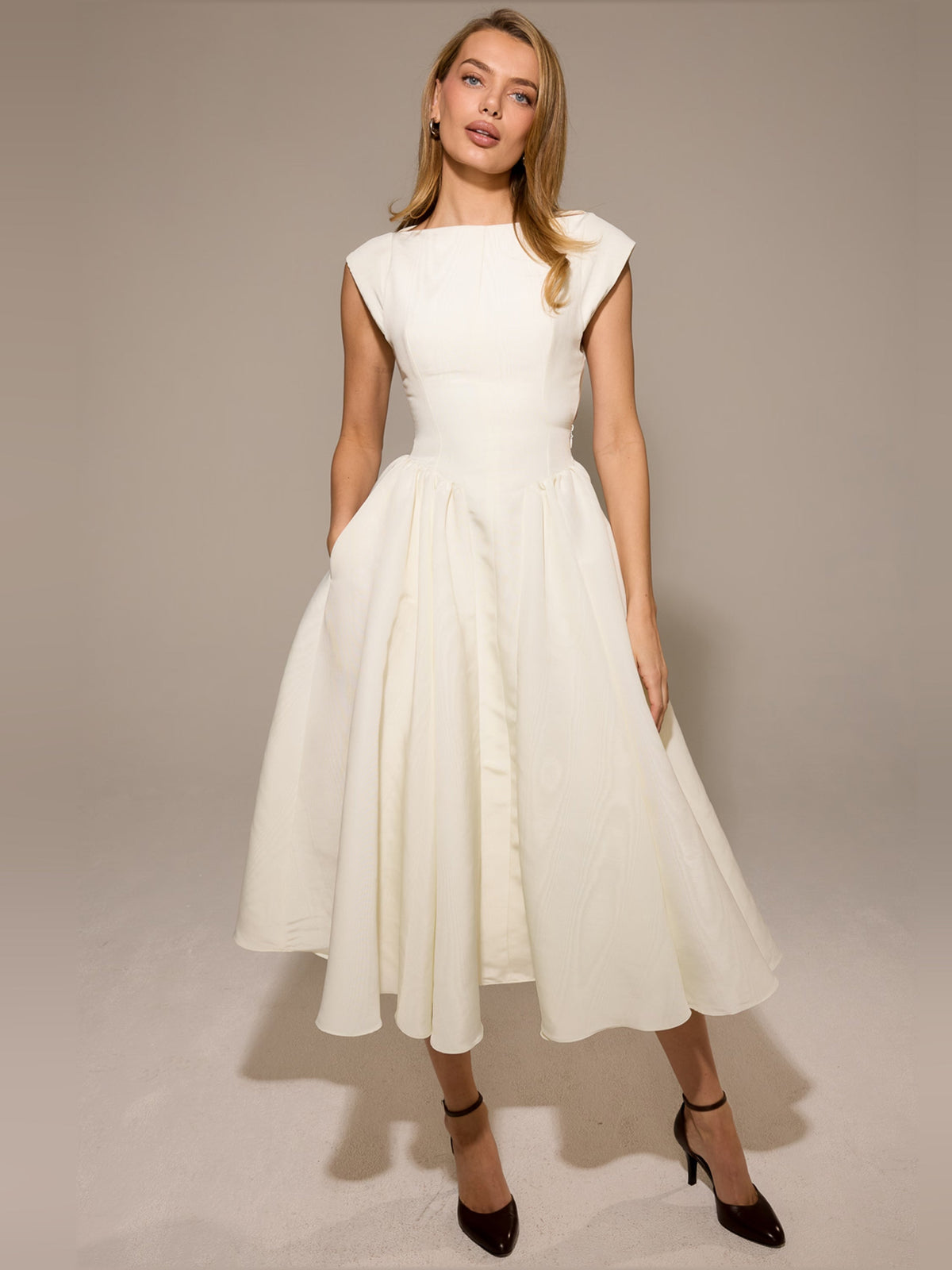 Ivory midi formal dress with cap sleeves and fitted waist, full gathered skirt