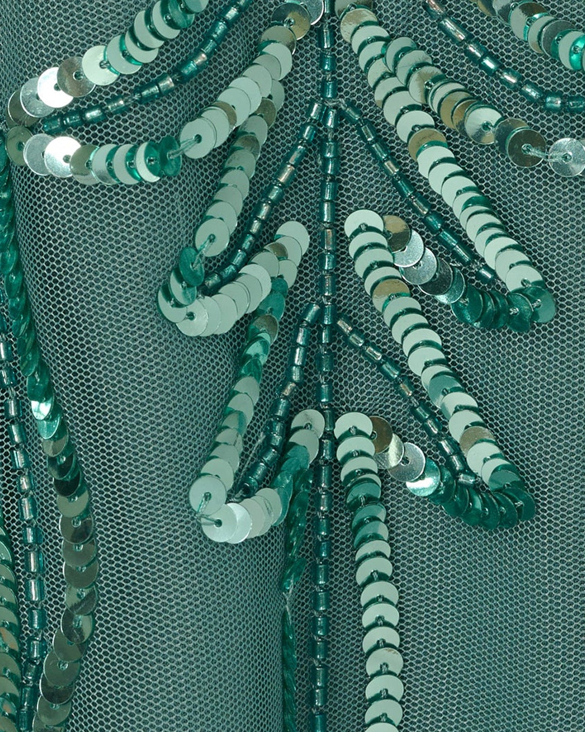 Teal sequin mesh fabric with dense silver sequins and decorative beaded pattern