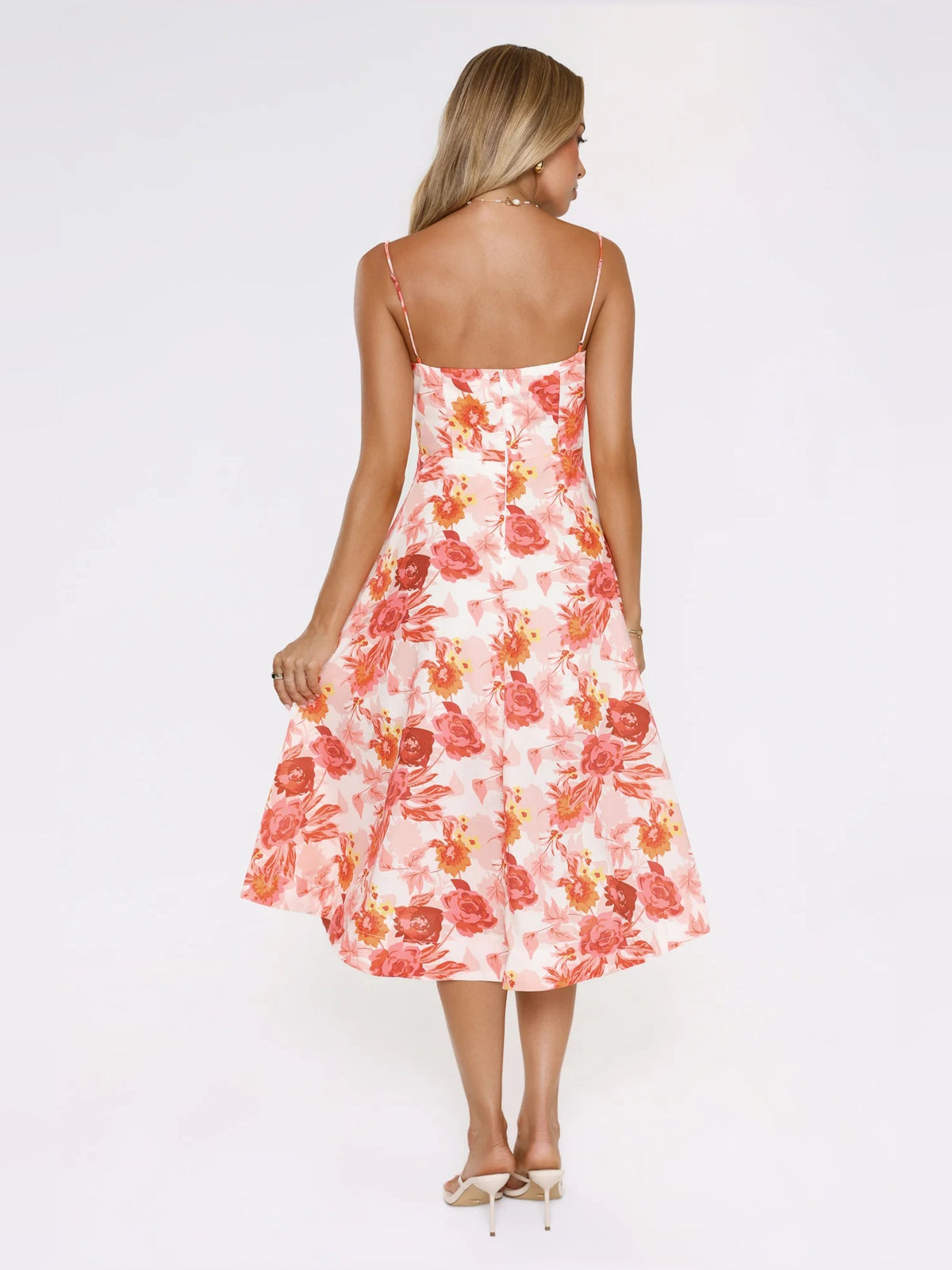 Floral midi formal dress back view with spaghetti straps and flared hem