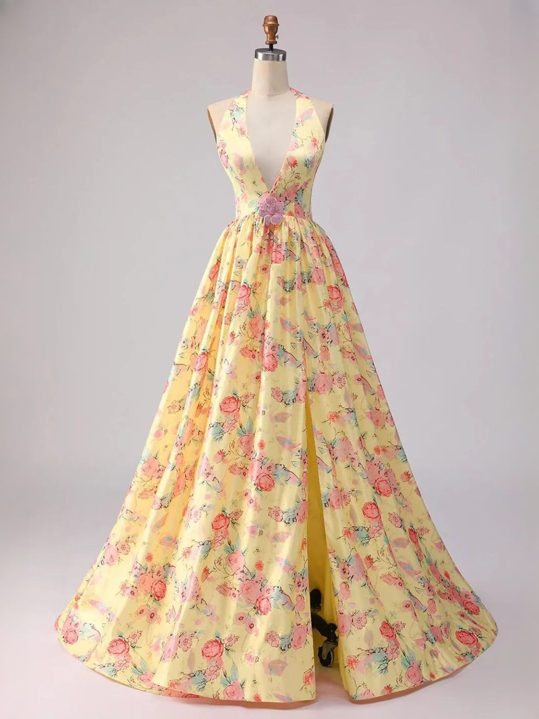 Champagne floral A-line prom dress on mannequin, sleeveless V-neck with front slit