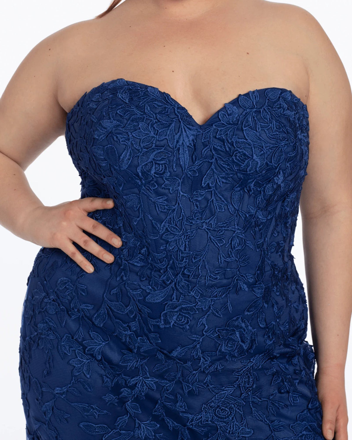Navy embroidered strapless corset bodice with textured floral roses and structured cups.