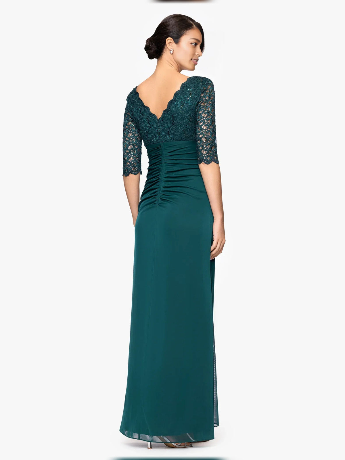 Peacock green V-neck jersey A-line gown with ruched waist and lace elbow sleeves, side view