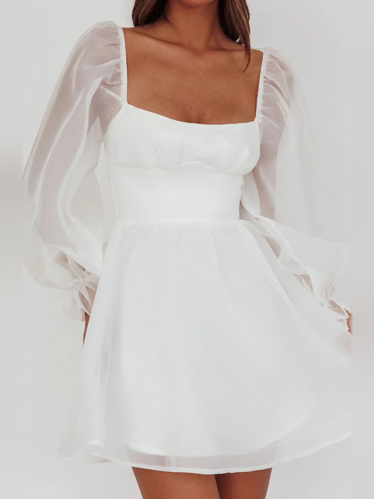 White mini A-line satin dress with square neckline and layered tulle puff sleeves