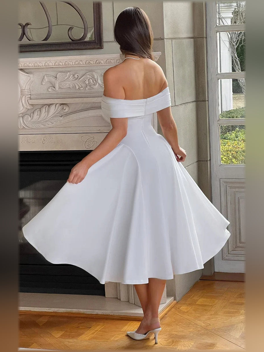White off-the-shoulder A-line midi formal dress, back view with full pleated skirt