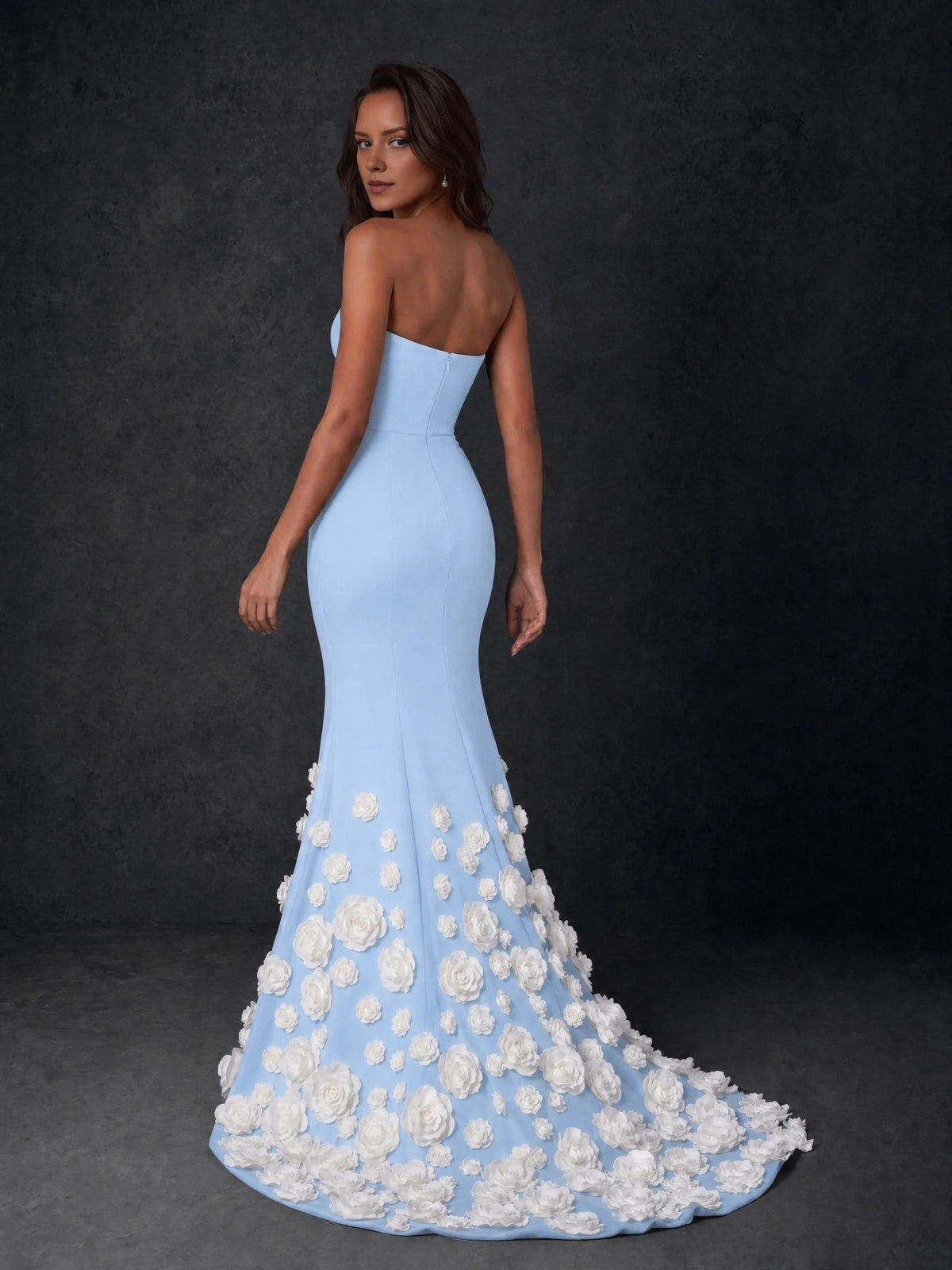 Light blue sweetheart strapless formal gown with white rose appliques on flared hem