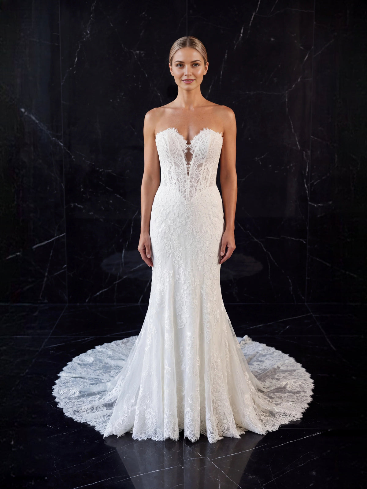 Ivory lace mermaid wedding dress with sweetheart neckline and flared hem